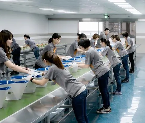 Finishing and quality-control area for decorated molded parts